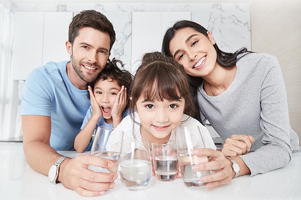 family-drinking-water